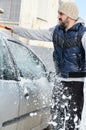 Man shovelling and removing snow