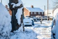 Man shovelling snow in the distance on a snowy day