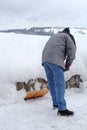 A man shovels snow Royalty Free Stock Photo