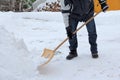 A man shovels snow Royalty Free Stock Photo
