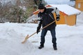 A man shovels snow Royalty Free Stock Photo