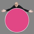 Man showing a blank pink circle