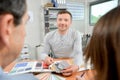 Man showing colour charts to couple Royalty Free Stock Photo