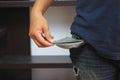 Man showing her empty pockets in office Royalty Free Stock Photo