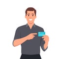 Man showing or holding credit or debit card inserted POS terminal payment card swipe machine and pointing hand. Payment, purchase Royalty Free Stock Photo