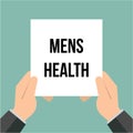 Man showing paper MENS HEALTH text