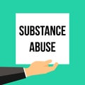 Man showing paper SUBSTANCE ABUSE text