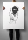 Man showing poster of Hand drawn light bulb Royalty Free Stock Photo