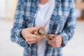 man showing size copper plumbing ring