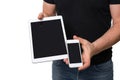 Man showing tablet vs smartphone Royalty Free Stock Photo