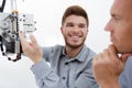 man showing teacher diy hexapod robot Royalty Free Stock Photo