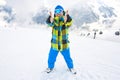 Man showing thumbs up on ski slope Royalty Free Stock Photo