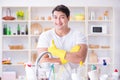 The man showing thumbs up washing dishes Royalty Free Stock Photo