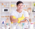 Man showing thumbs up washing dishes Royalty Free Stock Photo