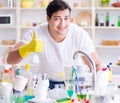 Man showing thumbs up washing dishes Royalty Free Stock Photo