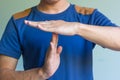 Man showing time out sign with hands. Royalty Free Stock Photo