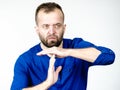 Man showing time stop gesture