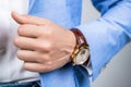 Man showing wristwatch. Deadline. Time management. Mens wristwatch. Luxury life and success. Male fashion accessory. Man