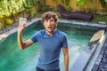 Man shows Dirt from the pool on a napkin Royalty Free Stock Photo