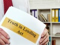 The man shows the Truth in Lending Act TILA.