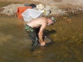 Man sieving for sapphires