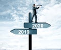 Man on 2019, 2020 sign