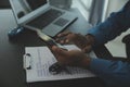 Man signing car insurance document or lease paper. Writing signature on contract or agreement. Buying or selling new or used Royalty Free Stock Photo