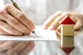 Man signing a contract when buying a new house Royalty Free Stock Photo