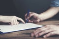 Man signing a document or writing correspondence Royalty Free Stock Photo