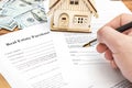 Man signs real estate purchase contract. Close up Royalty Free Stock Photo