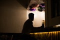 Man silhouette in cafe bar drink alcoholic drinks Royalty Free Stock Photo