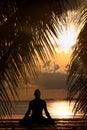 Man silhouette doing yoga exercise Royalty Free Stock Photo