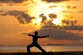 Man silhouette doing yoga exercise archer Royalty Free Stock Photo