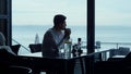 Man silhouette looking beautiful sea view relaxing luxury panoramic restaurant Royalty Free Stock Photo