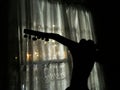 Man Silhouette Playing Guitar at Bedroom