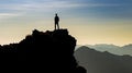 Man silhouette stay on sharp rock peak. Satisfy hiker enjoy view. Tall man on rocky cliff watching down to landscape. Generative Royalty Free Stock Photo