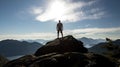 Man silhouette stay on sharp rock peak. Satisfy hiker enjoy view. Tall man on rocky cliff watching down to landscape. Generative