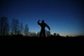 Man silhouette in sunset time in a field Royalty Free Stock Photo