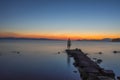 Man silhouette watching the sunset over the Mediterranean Sea from the Aegina island in Saronic gulf, Greece Royalty Free Stock Photo