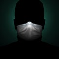 Man silhouette wearing medical mask