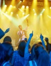 Man, singing and band or crowd at live concert performance for rock party, music festival or audience. Male people