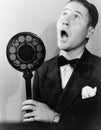 Man singing with radio microphone Royalty Free Stock Photo