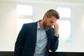 Man with sinus headache, tension or cluster headache, close up portrait. Head pain concept. Cephalalgia and migraine Royalty Free Stock Photo