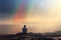 man sit on a cliff with beautiful rainbow view AI generated
