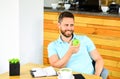 Man sit eat green apple fruit. Healthy snack. Lunch eat apple. Healthy habits. Coffee break to relax. Healthy man care Royalty Free Stock Photo