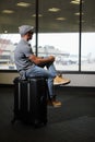 Funny man in airport with suitcase Royalty Free Stock Photo