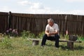 Man sits on bench