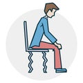 A man sits on a chair