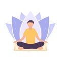 A man sits in a padmasana pose and meditates