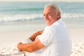 Man sitting on the beach Royalty Free Stock Photo